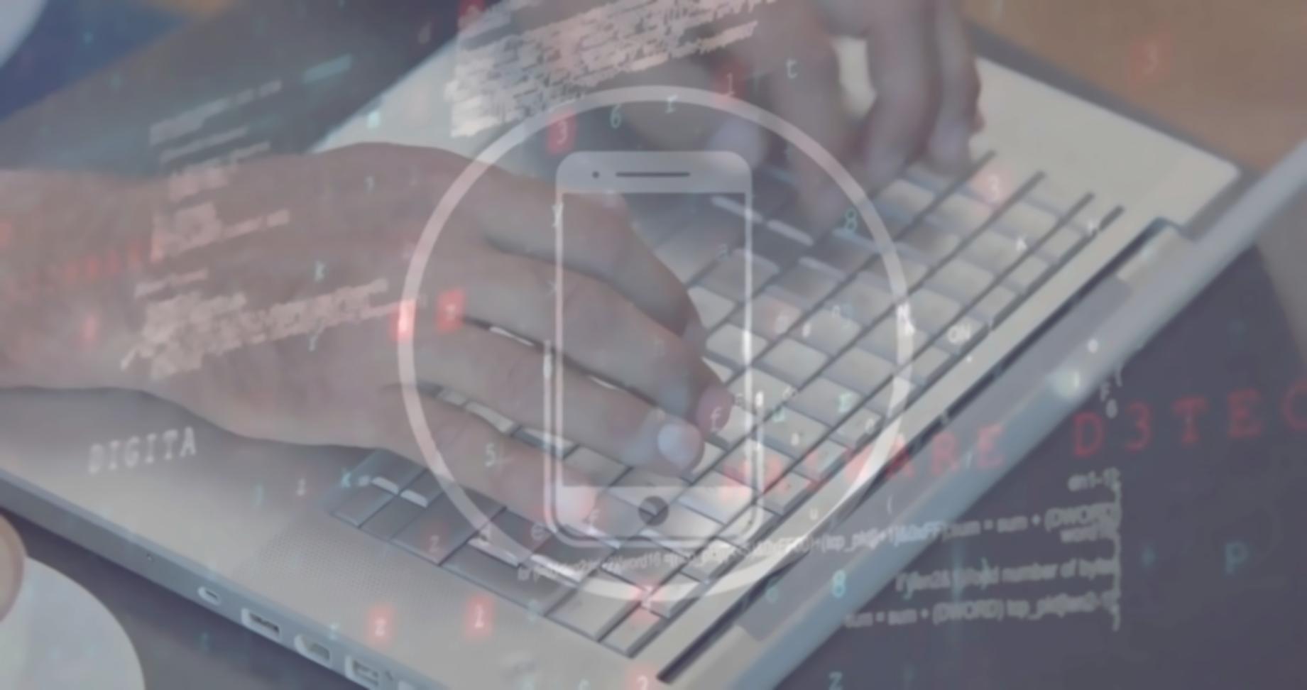 Participant working on automation script during hands-on workshop session